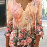 Blusa Floral con Mangas de Campana y Pliegues