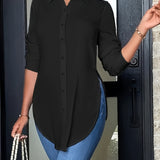Blusa larga con botones y abertura lateral