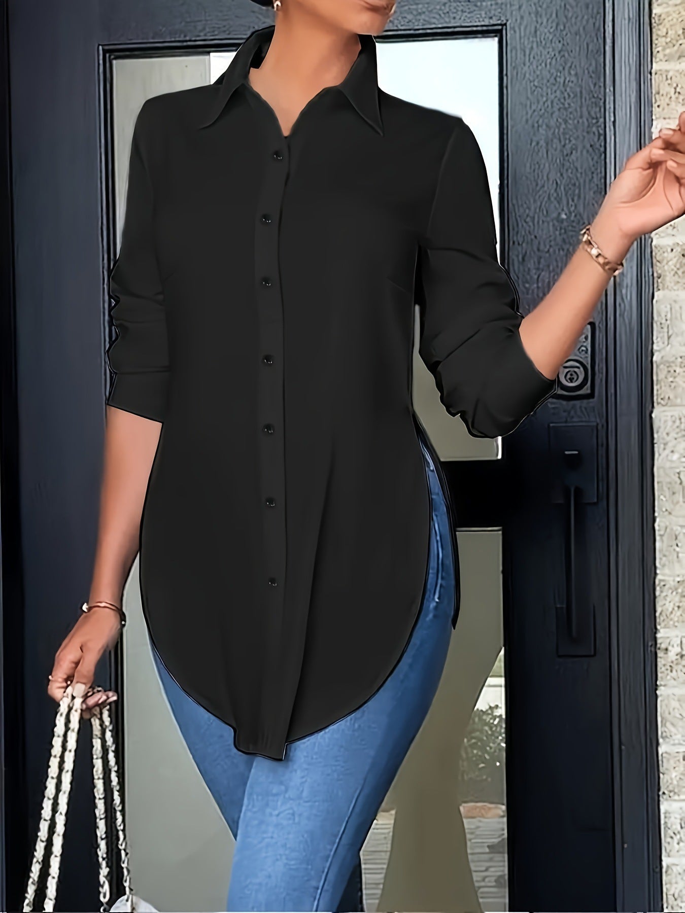 Blusa larga con botones y abertura lateral