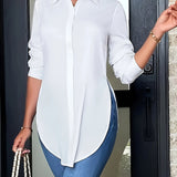 Blusa larga con botones y abertura lateral