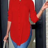 Blusa larga con botones y abertura lateral