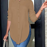 Blusa larga con botones y abertura lateral